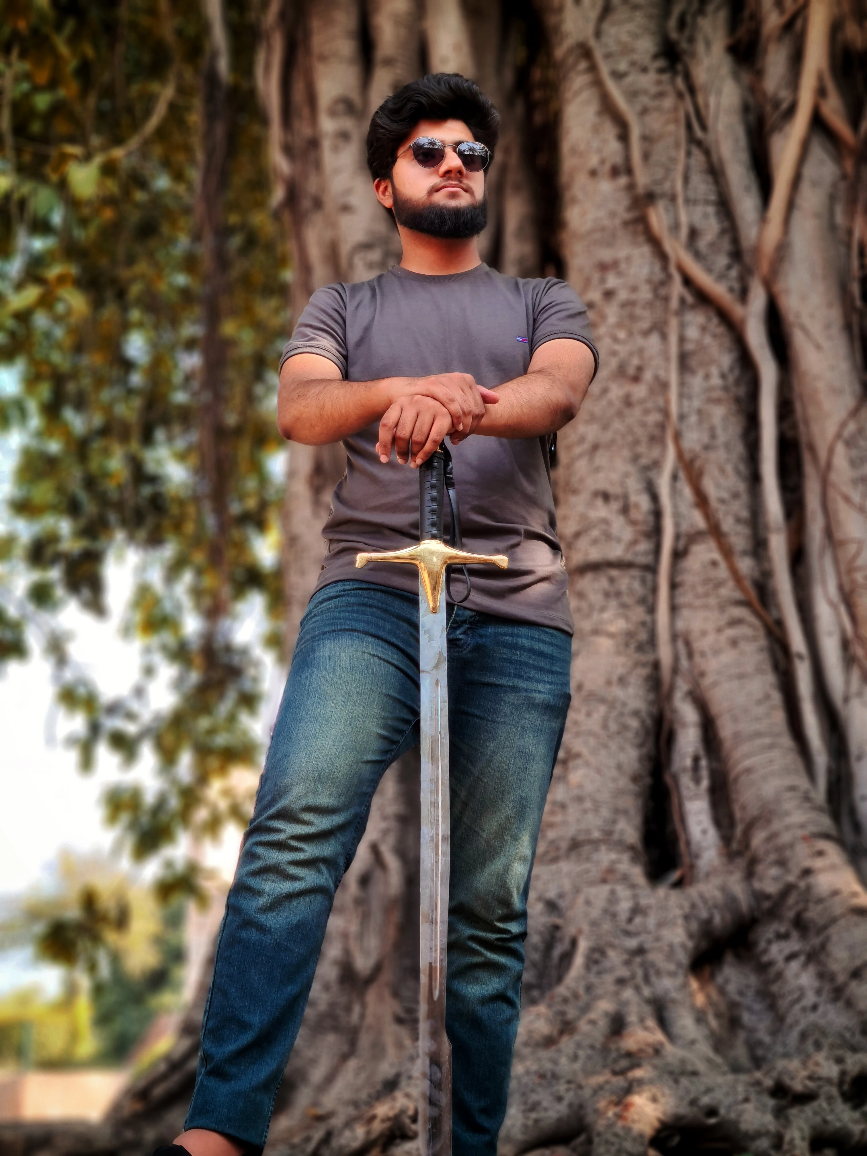 ProDeSquare portrait posing before a tree