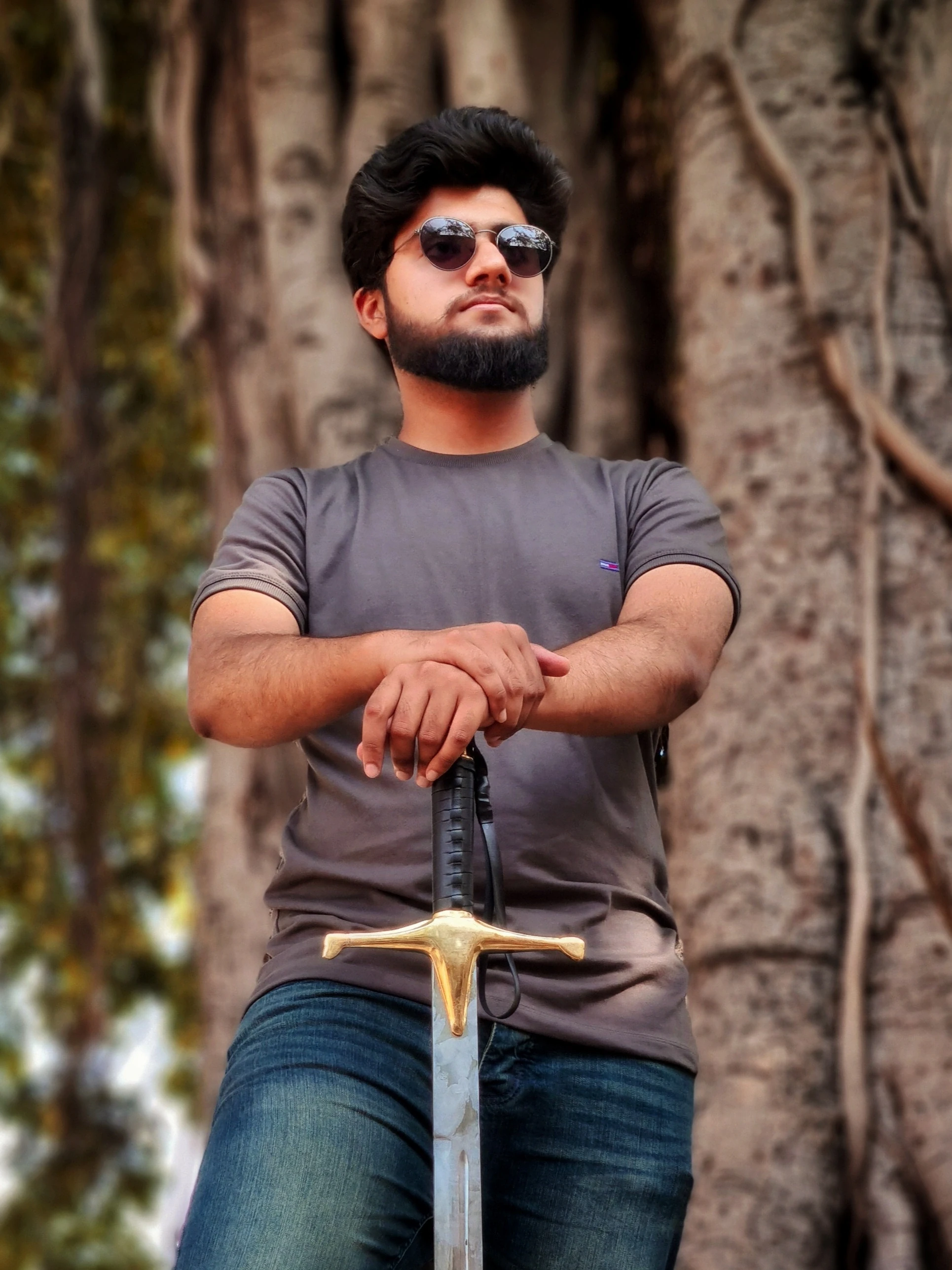 ProDeSquare portrait posing before a tree closeup