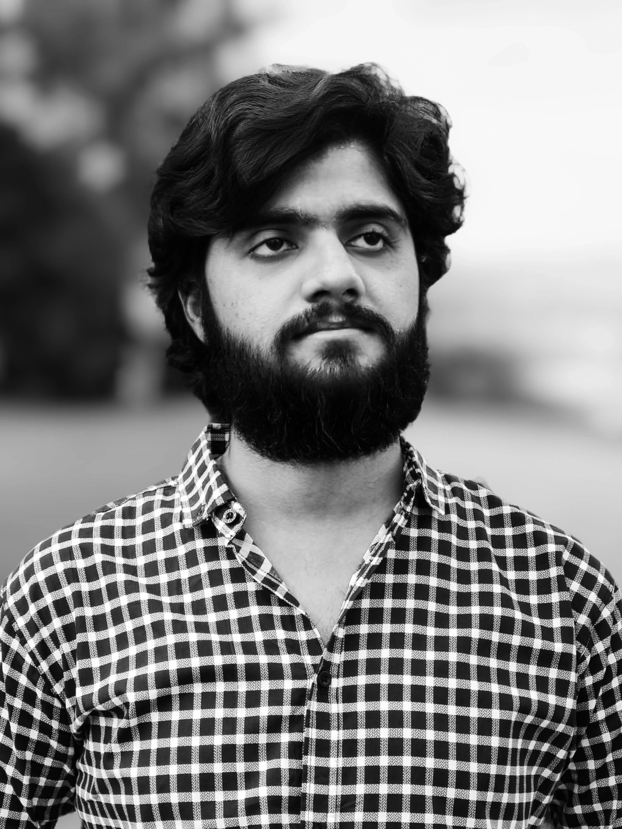 ProDeSquare with long beard and hair black and white portrait